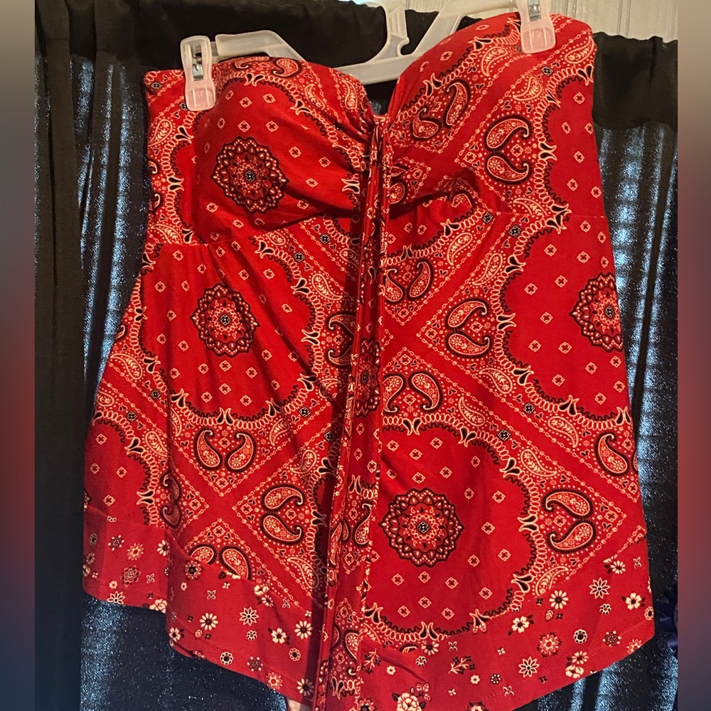 Red bandanna print top.